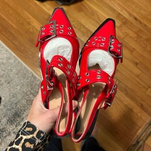 Red pointed toe buckle flats